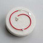 Pulsera de Plata 925 Flor de Ciruelo · Cordón Rojo